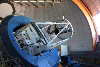 The Dark Energy Camera, mounted on the Blanco telescope in Chile, is the most powerful sky-mapping machine ever created. It has captured and recorded ancient starlight for the first time. <i>Courtesy of Dark Energy Survey Collaboration</i>