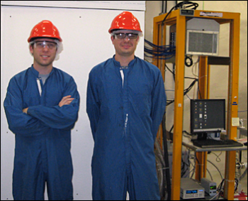 KICP Fellow Alvaro Chavarria (right) and Fermilab postdoc Javier Tiffenberg in front of the polyethylene shielding surrounding the DAMIC detector installed at SNOLAB.