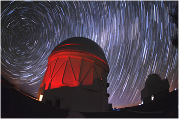 Technicians installed the $50 million Dark Energy Camera atop a telescope in Chile last year. <i>Image credit: Reidar Hahn/Fermilab</i>